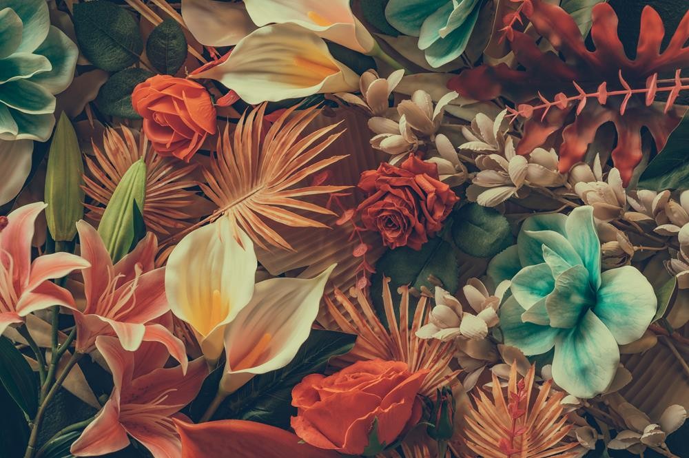 Bukiet z kwiatów i liści w pomarańczowej tonacji