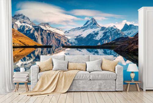 Panoramic morning view of Bachalp lake / Bachalpsee, Switzerland. Majestic autumn scene of Swiss alps, Grindelwald, Bernese Oberland, Europe. Beauty of nature concept background.