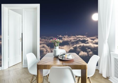 The moon over the clouds, View over the clouds, panorama of clouds at sunset, the sky with clouds and the sun aerial view, 3D rendering