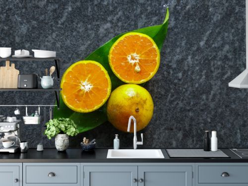 flat lay setup of orange isolated on plate and gray ceramic background.