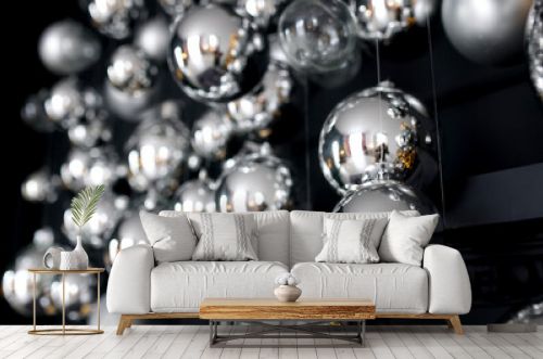 Christmas tree with modern silver balls in a festively decorated home. New Year's decoration and festive Christmas mood. Christmas tree with stylish decor.