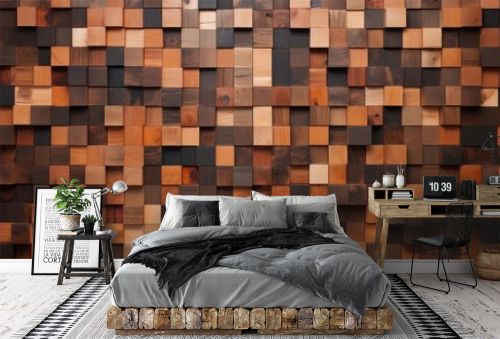 A close-up view of a wooden wall composed of various scraps arranged in a pattern of squares. The different shades and textures of the wood create an interesting and visually appealing background.