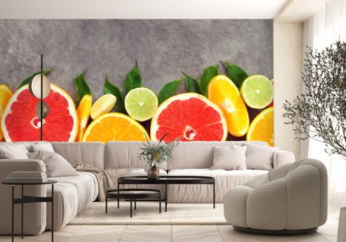 Fresh ripe sweet citrus fruits colorful background: orange, grapefruit, lime, lemon