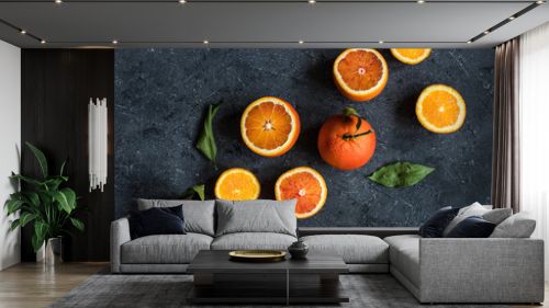 Citrus fruit background. Juicy oranges on gray background top view.
