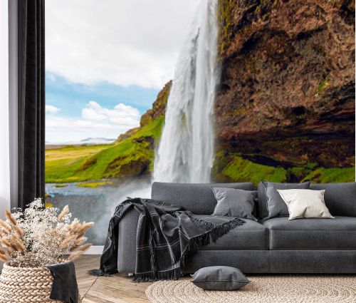 Seljalandsfoss waterfall - famous popular tourist destination in Iceland, part of the golden circle
