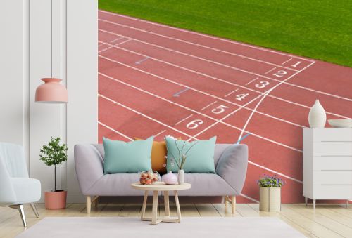 Staring grid numbers on a red athletics running track