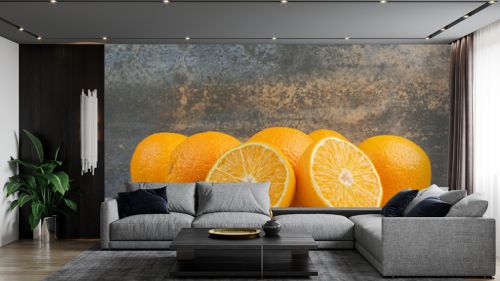 Fresh ripe oranges on stone table