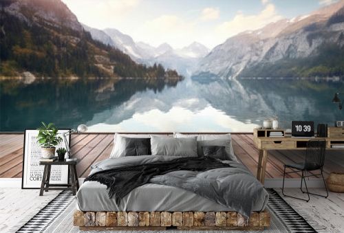 Wooden dock on the lake surrounded by a beautiful mountains, Generative AI