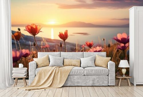 A beautiful image of a field of flowers with the sun setting in the background. Perfect for nature and landscape themes.