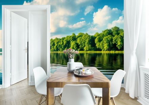 beauty of a tranquil lake, surrounded by lush greenery and mirrored reflections.