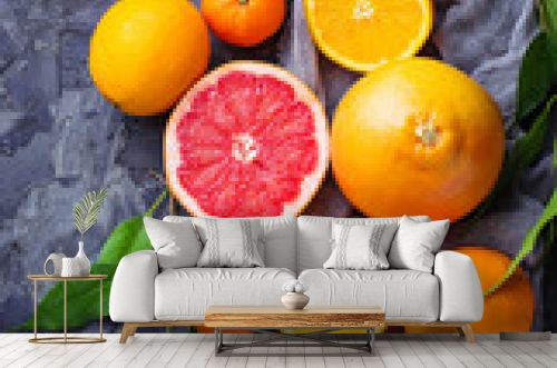 Dissected fresh fruits. Orange, grapefruit and tangerines