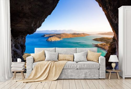 Panoramic view of the gulf of Elounda with Spinalonga island. View from the mountain through a cave, Crete, Greece.