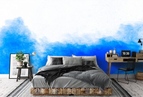 Blue color powder explosion cloud on white background.Closeup of Blue dust particles splash on background.