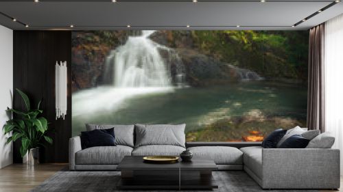 Waterfall with light beam